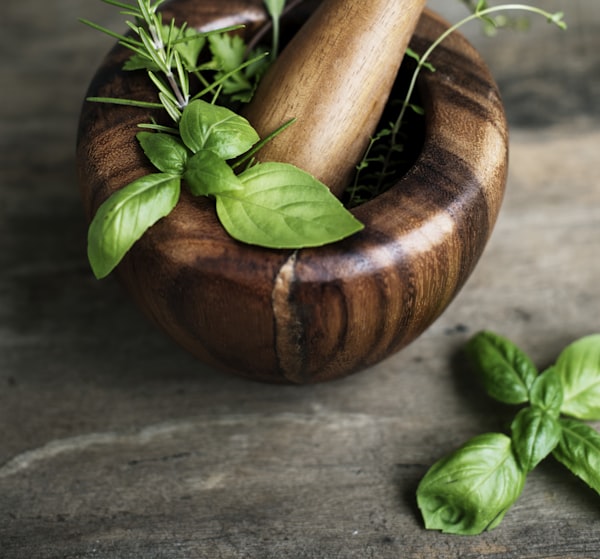 Mortar and pestle with herbs